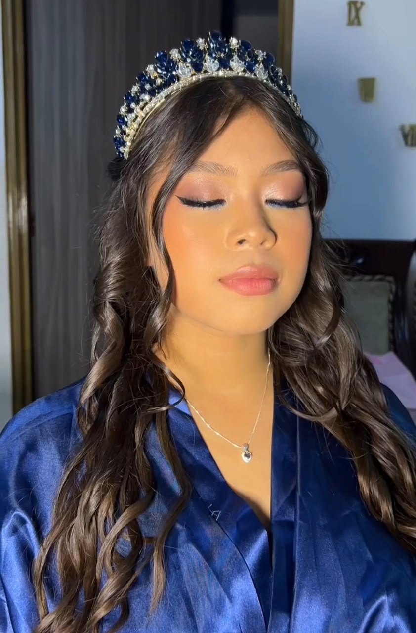 Quinceañera with tiara, makeup by Stefany