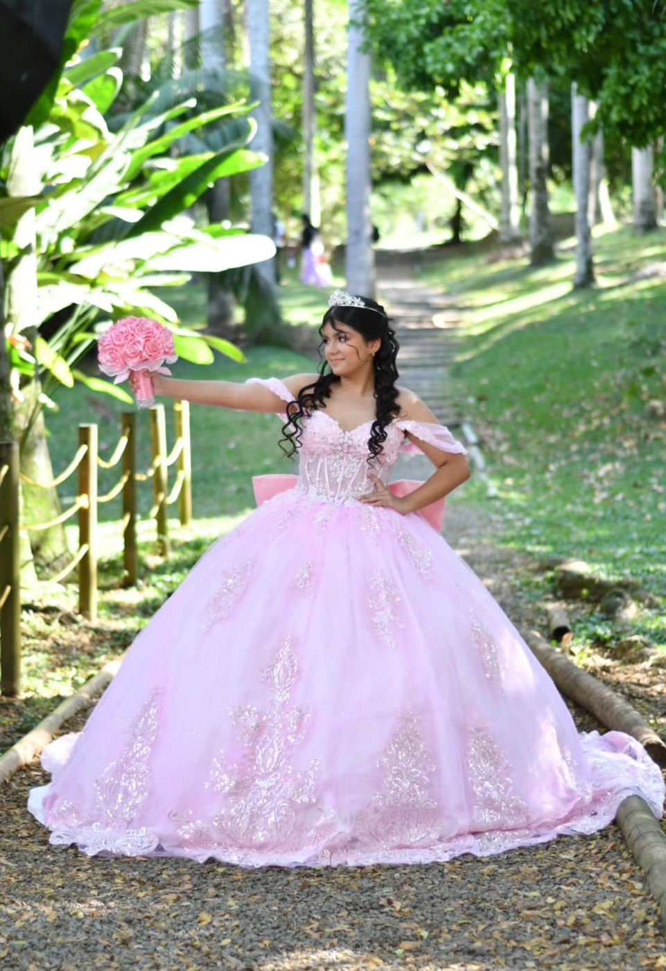 Quinceañera in a pink dress, makeup by Stefany